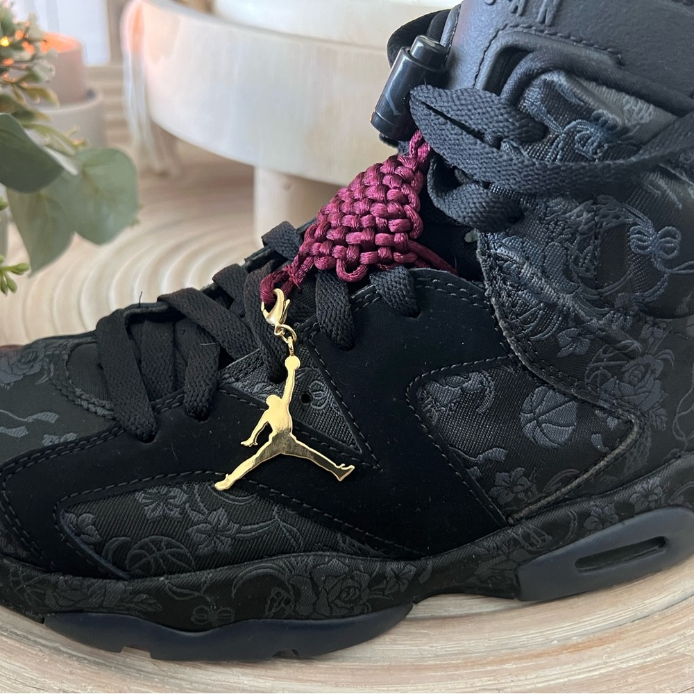 Air Jordan Black Sneakers with Gold Accent